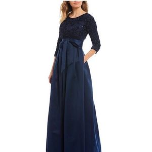 Beautiful metallic blue dress, long sleeves.